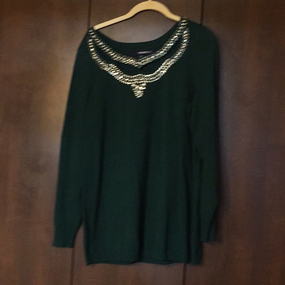 Green sweater with jeweled neckline